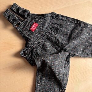 Vintage OshKosh B'gosh 2T black and flowers overalls with bow.